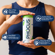 A person in a navy sleeveless top holds a can of PHOCUS Super Apple Caffeinated Sparkling Water. The can is white with green accents and the words 'Crisp Apple' and 'Phocus'.